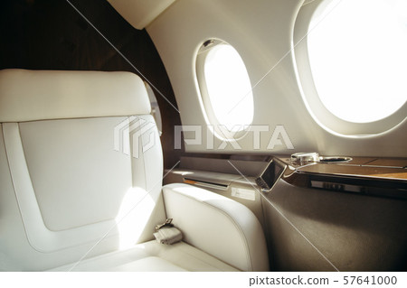 modern and comfortable interior of business jet aircraft with decor 57641000