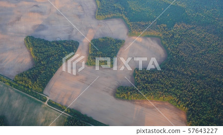 Flight over the Russian fields and water purification station. Flight over the Russian fields and water purification station. 57643227