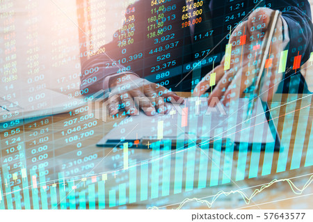 Stock market or forex trading graph and candlestick chart suitable for financial investment concept. Economy trends background for business idea and all art work design. Abstract finance background. Stock market or forex trading graph and candlestick chart suitable for financial investment concept. Economy trends background for business idea and all art work design. Abstract finance background. 57643577