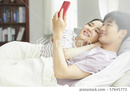 Couple lifestyle bedroom 57645773