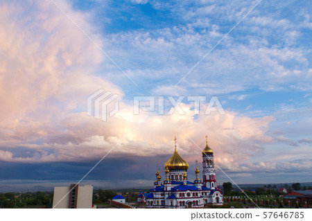 Russian Orthodox Cathedral of the Nativity in Novokuznetsk against a beautiful sky with beautiful Russian Orthodox Cathedral of the Nativity in Novokuznetsk against a beautiful sky with beautiful 57646785