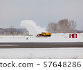 Snowplow cleans snow 57648286