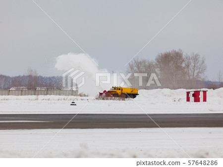 Snowplow cleans snow 57648286