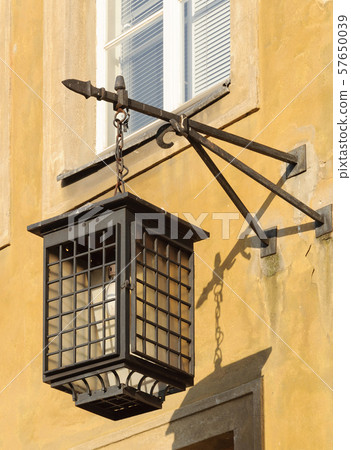 Lantern on the wall of old house Lantern on the wall of old house 57650039