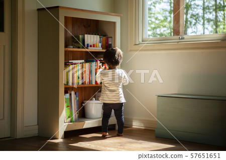 Children choosing books Children choosing books 57651651