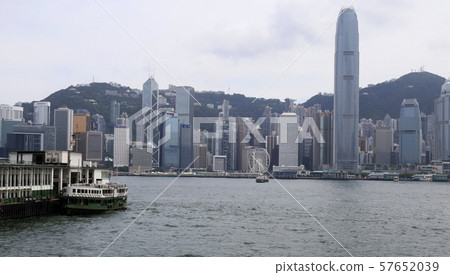 Star ferry landing on Kowloon Peninsula facing Hong Kong Bay and skyscraper on Hong Kong Island Star ferry landing on Kowloon Peninsula facing Hong Kong Bay and skyscraper on Hong Kong Island 57652039