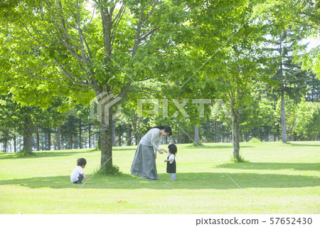 Families playing in the park Families playing in the park 57652430