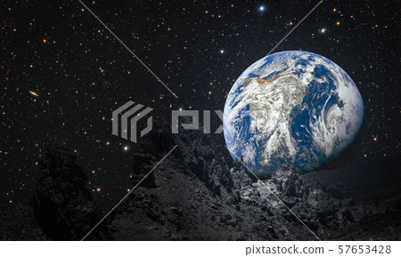 mountains on the moon overlooking planet earth 57653428