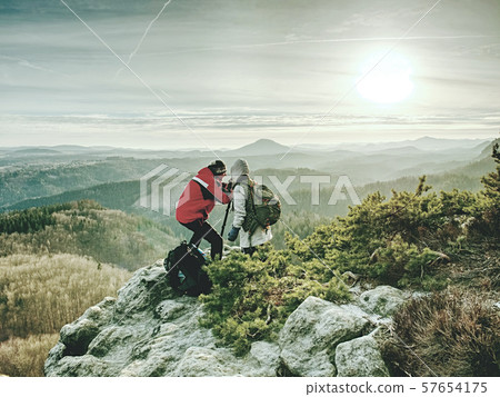 Photographer and woman photographing with camera 57654175