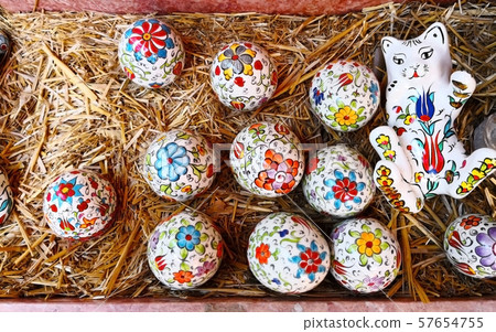 Religion and Easter day concept. Ceramic kitten Religion and Easter day concept. Ceramic kitten 57654755