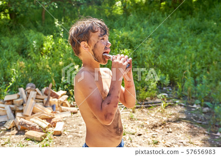 The child smeared the face, hands and body in the 57656983