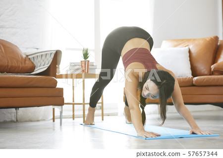 Female yoga instructor Female yoga instructor 57657344