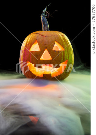 Halloween pumpkin head jack lantern with scary evil face Halloween pumpkin head jack lantern with scary evil face 57657706