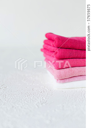 Pink and white textile on white background 57659875