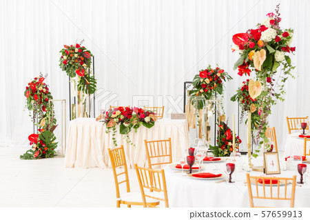 Red decor theme. Beautiful banquet a wedding reception. Interior of a wedding tent decoration ready 57659913
