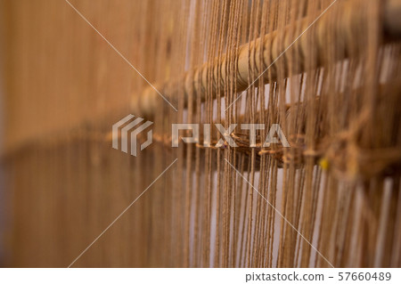 Old style tool for weaving a carpet with traditional techniques on a loom, in the privat family Old style tool for weaving a carpet with traditional techniques on a loom, in the privat family 57660489