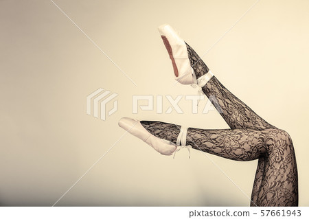 Female legs dancer in ballet shoes 57661943