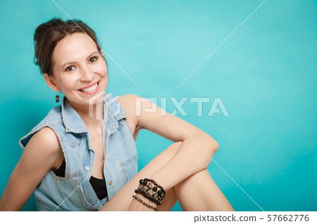 Summer fashion girl in jeans shirt on blue 57662776