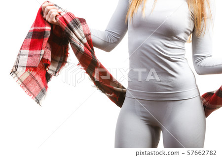 Sport fit woman in thermal clothes. Sport fit woman in thermal clothes. 57662782