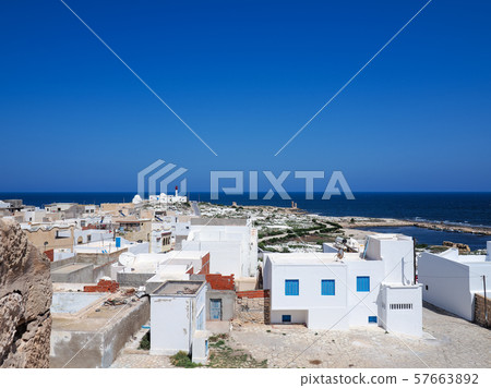 Tunisia Mahdia white houses and blue sea / houses in Mahdia, Tunisia Tunisia Mahdia white houses and blue sea / houses in Mahdia, Tunisia 57663892