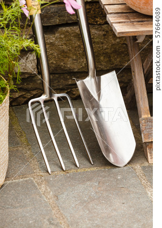 Standing steel fork harrows rake and shovel 57664089