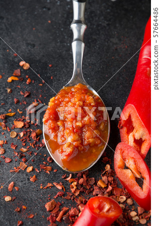 Traditional adjika hot chili pepper sauce paste 57664486