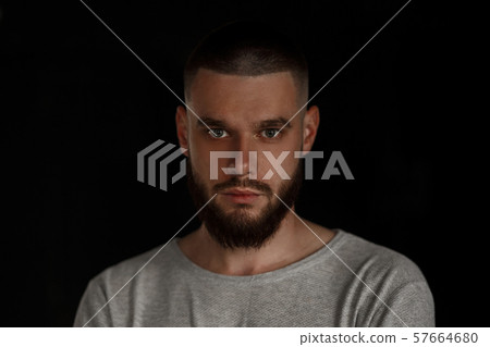 Close-up portrait of a young handsome man  57664680