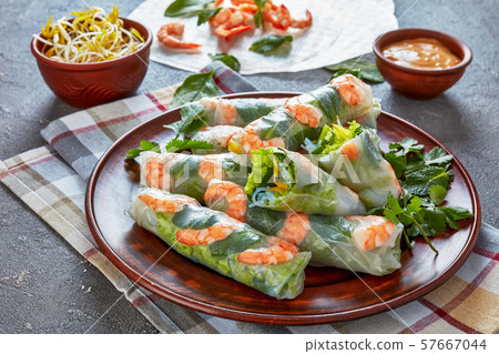 Asian spring rolls of rice paper with shrimps 57667044