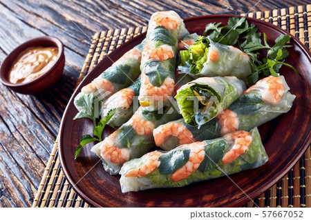raw Asian spring rolls of rice paper 57667052