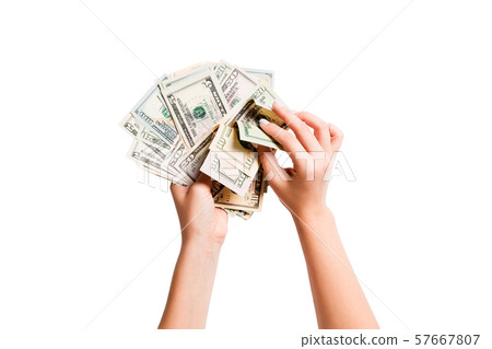 Top view of a bundle of money in female hands. 57667807