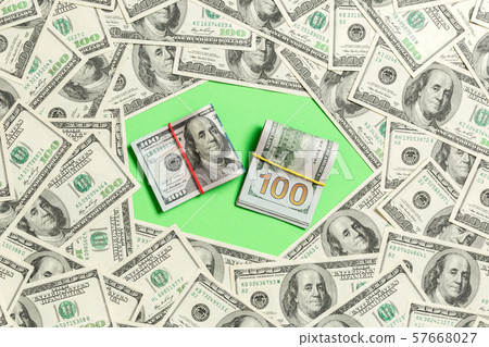 Frame of one hundred dollar bills with stack of Frame of one hundred dollar bills with stack of 57668027