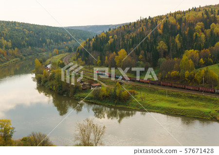 landscape autumn river valley between the hills 57671428