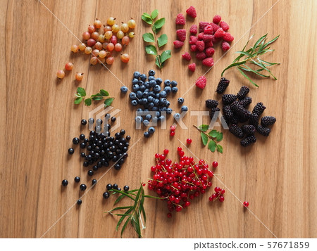 summer berries on a wooden table summer berries on a wooden table 57671859