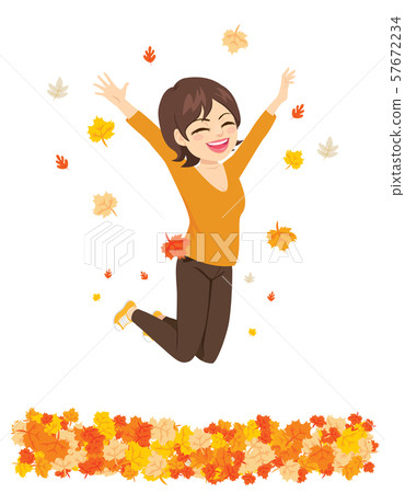 Happy autumn time woman jumping over fall leaves Happy autumn time woman jumping over fall leaves 57672234