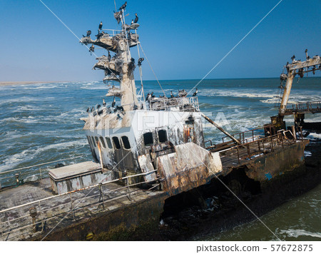 Abandoned and derelict old shipwreck Zeila at the Atlantic Coast near Swakopmund and famous Skeleton 57672875