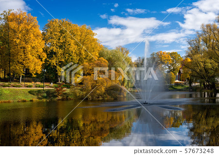 Valmiera. Latvia. City autumn landscape with a pond and fountain. 57673248