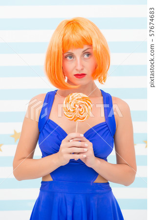 happy pinup model with lollipop in hand. Crazy happy pinup model with lollipop in hand. Crazy 57674683