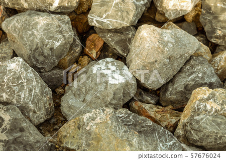 closeup gray stone cobble gray uneven gravel 57676024