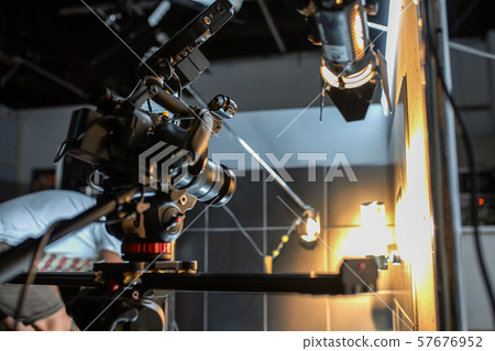 Behind the scenes of filming movies and video products, setting up equipment for shooting video and 57676952