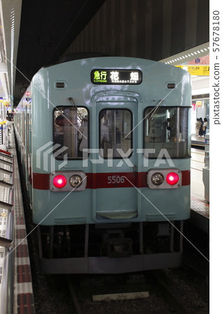 Nishitetsu Type 5000 stopping at Nishitetsu Fukuoka (Tenjin) Station Nishitetsu Type 5000 stopping at Nishitetsu Fukuoka (Tenjin) Station 57678180