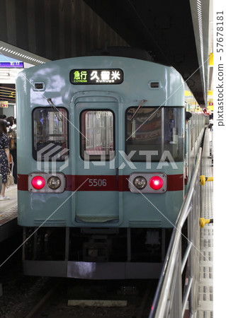 Nishitetsu Type 5000 stopping at Nishitetsu Fukuoka (Tenjin) Station Nishitetsu Type 5000 stopping at Nishitetsu Fukuoka (Tenjin) Station 57678181