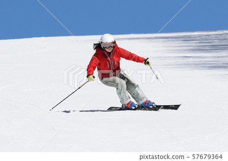 Female skier Female skier 57679364