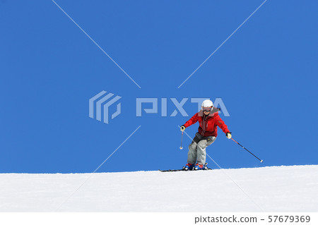 Female skier Female skier 57679369