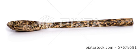 Used wooden spoon isolated on white background 57679581