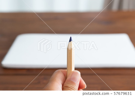 Sketchbooks and colored pencils 57679631