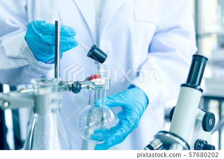 Team work Scientists analyzing study data 57680202