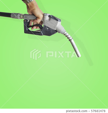 Hand holding a fuel nozzle Hand holding a fuel nozzle 57681478