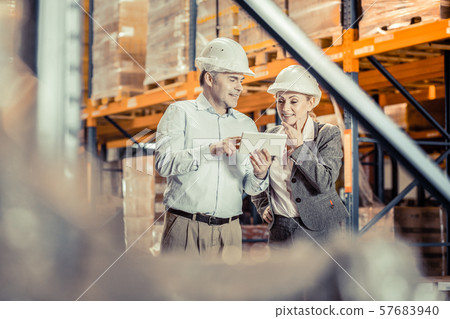 Positive delighted people discussing their business plan Positive delighted people discussing their business plan 57683940