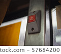 low angle of red stop button on bangkok bus 57684200