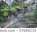 view of beautiful waterfall in green garden 57684219